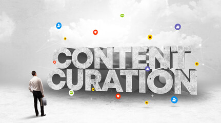 Young businessman standing in front of CONTENT CURATION inscription, social media concept