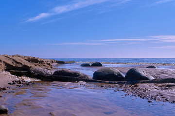 Fototapeta na wymiar Big stones Baltic sea shore near Tuja in Old Rocks, Veczemju klintis Latvia