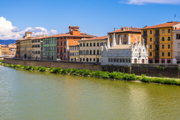 Pisa, Italy - August 14, 2019: Gothic church Santa Maria della Spina on the embankment of the Arno River in Pisa, region of Tuscany, Italy