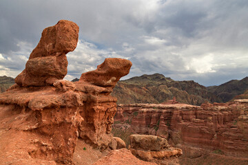 Fototapeta na wymiar Charyn Canyon with its geological rock formations in Kazakhstan