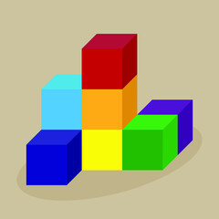 Tower of multi-colored cubes on a beige background