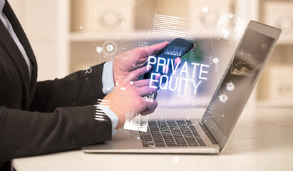 Side view of a business person working on laptop with PRIVATE EQUITY inscription, modern business concept