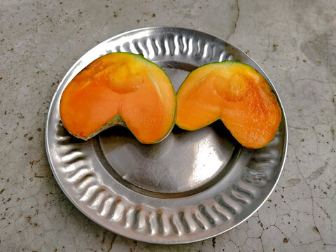 Heart shape Ripe mangoo the pot