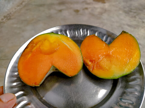 Organic Fresh Ripe Mango fruit on the plate