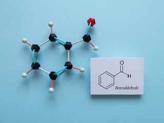 Molecular structure model and structural chemical formula of benzaldehyde. It is an aromatic...