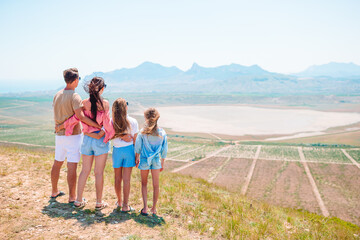 Happy family on vacation in the mountains