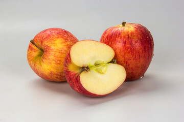Selected apples and apple slices over white background