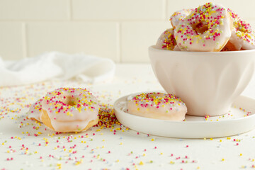 donuts with pink and white sugar