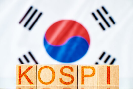 kospi index KOREA. wooden blocks with the inscription kospi on the background of the korea flag