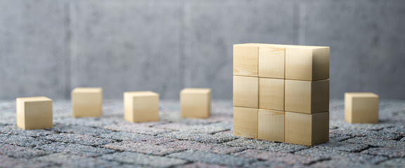 empty cubes for own message on stone pavement and conrete background