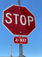 stop sign on blue sky