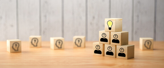 cubes showing a brainstorming session on concrete background