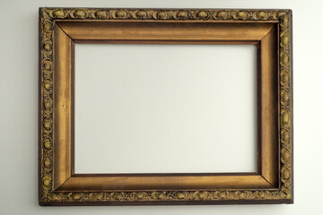 Gilded frame from an old painting on white isolate