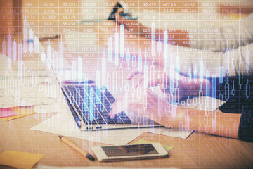 Multi exposure of woman hands typing on computer and financial chart hologram drawing. Stock market analysis concept.