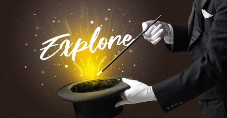Magician is showing magic trick with Explore inscription, traveling concept