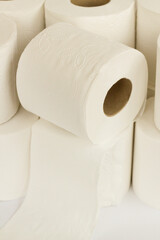 Clean toilet paper roll heap on white background.Close up taken