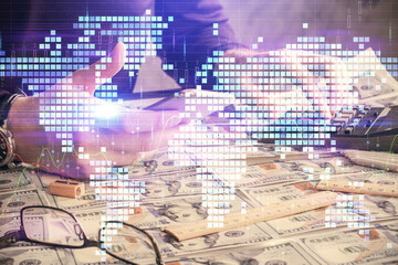 Double exposure of man's hands holding and using a phone and international business theme drawing.