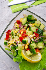 Hawaii style vegetarian raw eating salad.  served in beautiful bowl on white table. flat lay