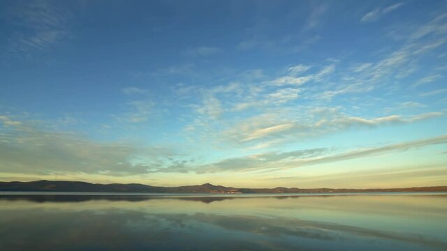 Time-lapse of beautiful sky and Lake Bracciano at dusk