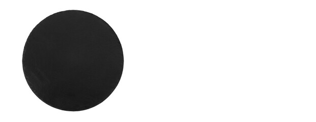 Round rustic black slate stone plate isolated on white background, top view and copy space