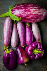 Purple bell peppers and eggplants