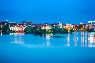 Belarus Travel Destinations. MInsk City View With Trinity Suburb and Svisloch River in At Twilight....