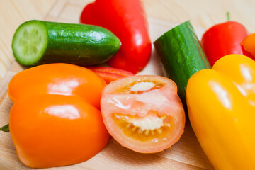 Healthy and Organic Food Concepts. Variety of Fresh Vegetables placed on Wooden Plate in Bulk.
