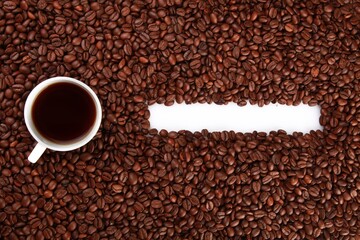 Coffee Beans And Cup Of Coffee