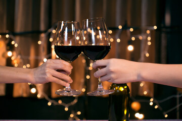 Waitress man pouring wine into glass