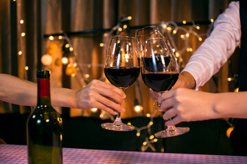 Celebrate whiskey wine on a friendly party in  restaurant