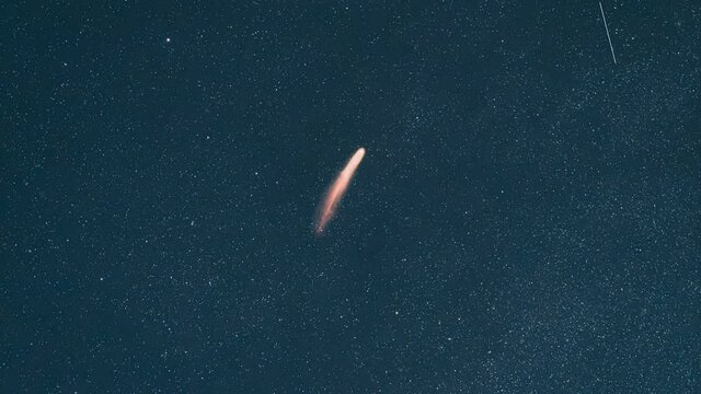 The flighting comet on the starry sky background. hyper lapse