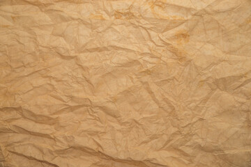 Old grunge paper texture.The texture of the paper is wet, old, yellowed with time. Torn, stained.