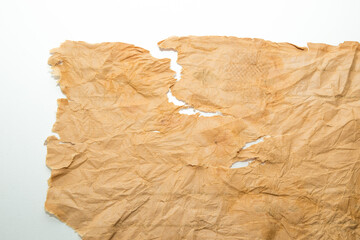 Old grunge paper texture.The texture of the paper is wet, old, yellowed with time. Torn, stained.