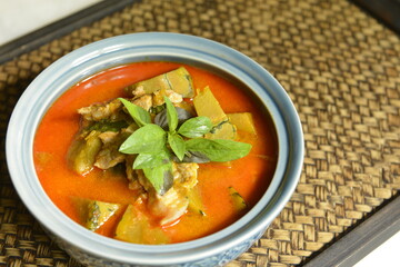 Thai curry Soup with Pumpkin, Pork and Thai herb ingredient.