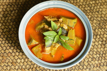 Thai curry Soup with Pumpkin, Pork and Thai herb ingredient.