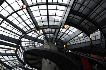 Spiral staircase in glass and metal construction. Spiral staircase at the Curitiba Memorial, Brazil.