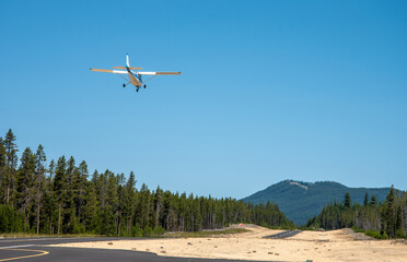 Small airplane on approach to short runway