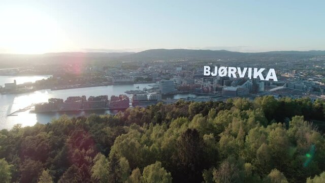 Aerial view of downtown Oslo in sunset with sticky Bj&oslash;rvika 3D text label
