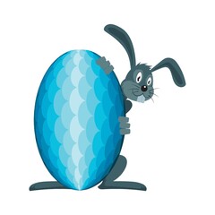bunny hiding behind an easter egg