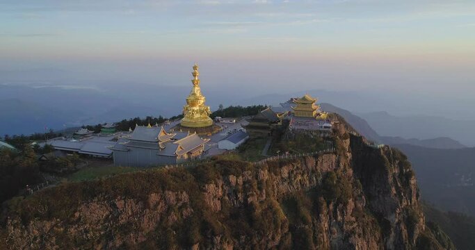 Aerial above view of Emei Jinding in the morning at Sichuan China UNESCO World Heritage site 4k drone footage