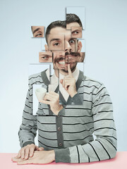 Surreal portrait of man made of different pieces of photos. Art collage. Mirror effect face....