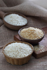 Fototapeta na wymiar Indian basmati rice variety on a wooden background