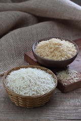 Fototapeta na wymiar Indian basmati rice variety on a wooden background