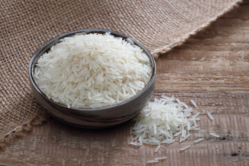 Indian basmati rice variety on a wooden background