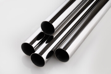 steel tubes and pipes on a white base
