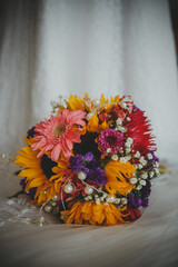 bouquet of flowers and wedding dress