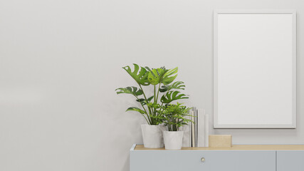 Plant in flower pot near empty picture frame. 3d rendering of white home interior.