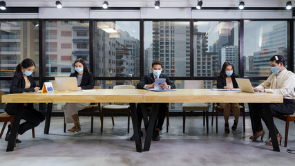 new normal office practise to keep social distance and wearing mask