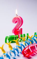 lit number candles with a ribbon