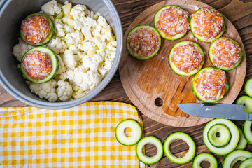 Fresh green zucchini cut into circles prepared for stuffing